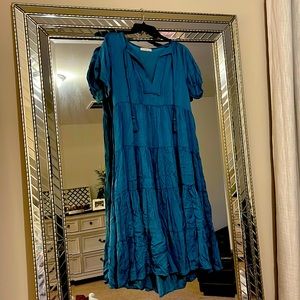 Karlie dress in teal. Super soft. Slight hi-lo. String tie at neck. Size L.